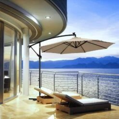 10 Ft. Steel Solar Lighted Cantilever Patio Umbrellas With Sandbag Weighted Base In Beige -Jearey cantilever umbrellas 10dzxj beige 31 1000