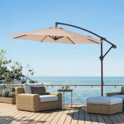 10 Ft. Cantilever Round Offset Patio Umbrella In Beige -Jearey jearey cantilever umbrellas 10xjs2 bg 31 1000