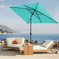 6.5 Ft. X 10 Ft. Steel Market Tilt Patio Umbrella In Peacock Blue -Jearey jearey market umbrellas 6 5jxs pb 31 1000