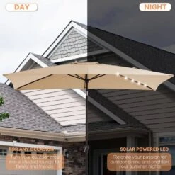 6.5 X 10 Ft. Market Solar LED Lighted Tilt Patio Umbrella Rectangular Outdoor Umbrella In Beige -Jearey jearey market umbrellas 6 5x10zzs dz be a0 1000