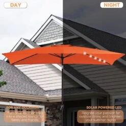 6.5 X 10 Ft. Market Solar LED Lighted Tilt Patio Umbrella Rectangular Outdoor Umbrella In Pumpkin -Jearey jearey market umbrellas 6 5x10zzs dz or a0 1000