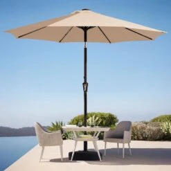 9 Ft. Market Solar LED Lighted Tilt Patio Umbrella Outdoor Steel Umbrella In Beige -Jearey jearey market umbrellas dzzzs 9 bg 40 1000
