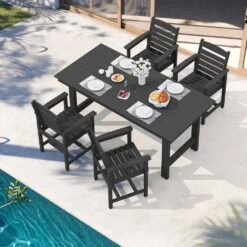 Charlottetown Black 7-Piece Wicker Outdoor Dining Set With Black Cushion -Jearey jearey patio dining sets xzxxy black 31 1000