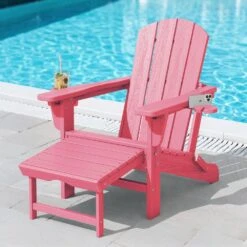 3-Level Adjustable Patio Folding Plastic Adirondack Chair With Retractable Ottoman, Cup And Phone Holders In Light Pink