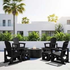 Black Outdoor All-Weather HDPE Plastic Rocking Adirondack Chair With Coordinated Gliding Footrest -Jearey jearey plastic adirondack chairs drybqwy bk 31 1000