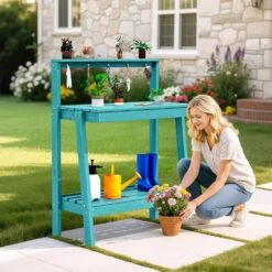 45.5 In. H X 34.8 In. W X 17.7 In. D Peacock Blue HDPE Potting Bench Table, Multi-Purpose Plant And Storage Shelf -Jearey peacock blue jearey potting benches and tables jyyygzt kql 31 1000
